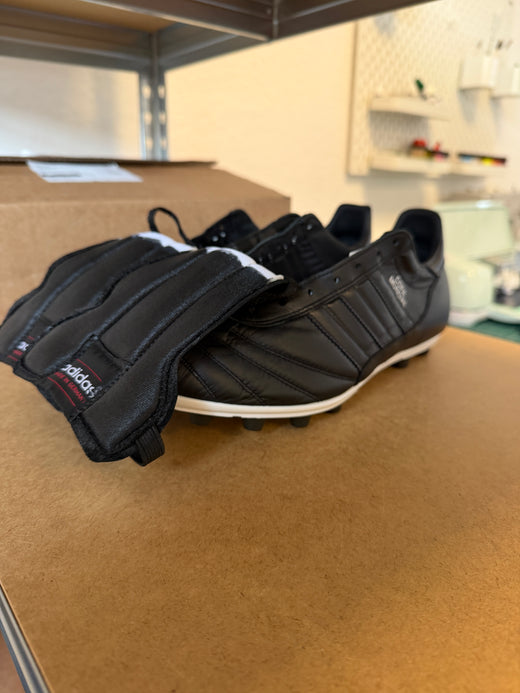 Custom boots by Custom Blackouts